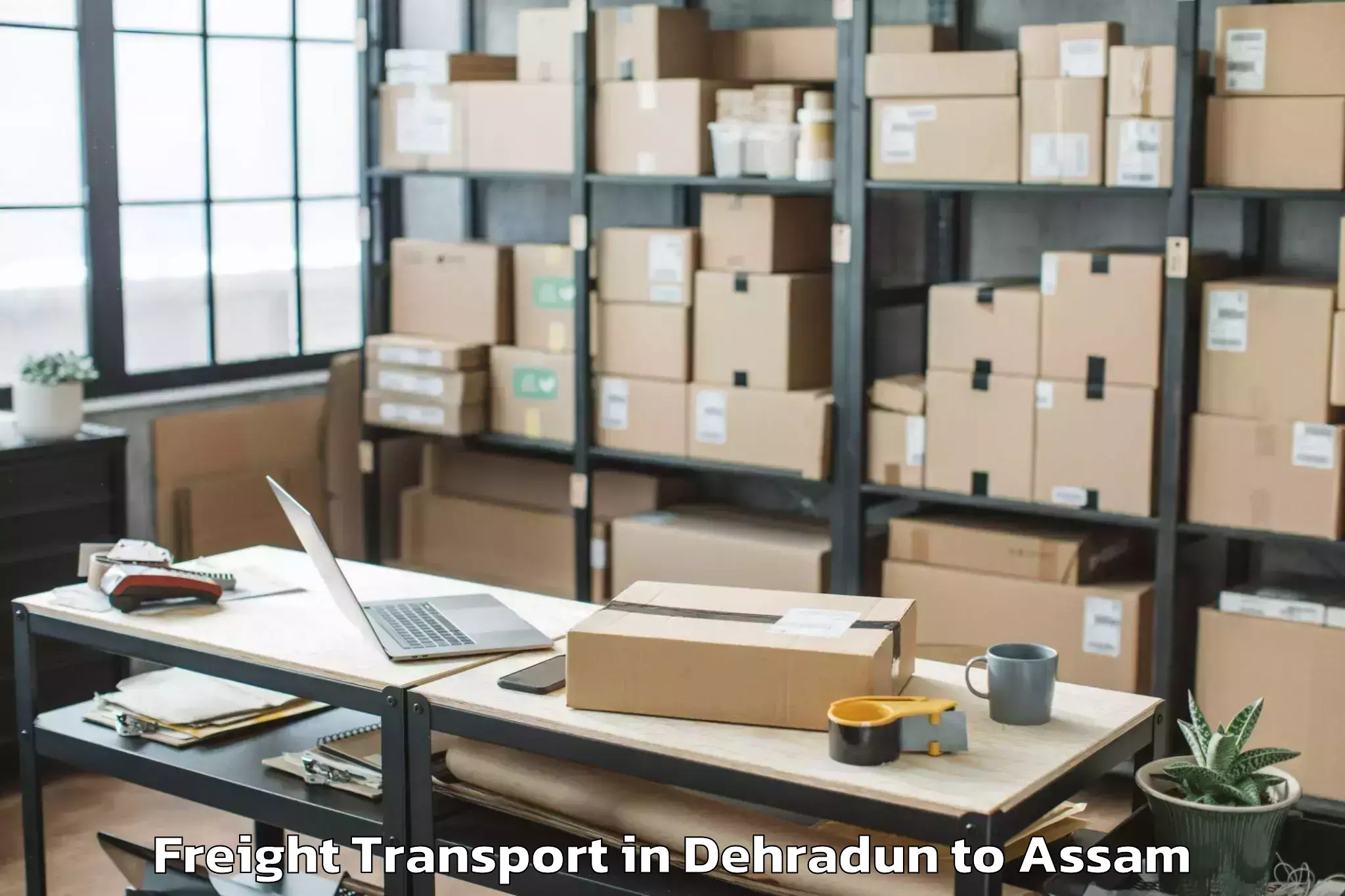 Affordable Dehradun to Gossaigaon Freight Transport